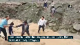 Teachers help students cross overflowing drain in Uttarkashi