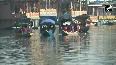 Tourists are enjoying the morning weather at Dal Lake in Srinagar