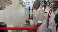 TN Fisheries Minister irons clothes during campaign in Chennai