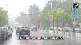 Mumbaikars enjoy the rain at Marine Drive