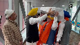 Hardeep Puri,Nadda carry Guru Granth Sahib brought from Afg