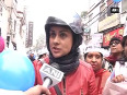 Women s wing of aap organises bike rally as a show of strength in krishna nagar