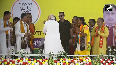 PM Modi bows down to woman during his rally in West Bengals Birbhum