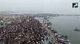 Prayagraj Devotees Take Holy Dip at Triveni Sangam on the Third Day of Maha Kumbh 2025