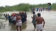 Villagers carry dead body through flooded river in TN