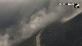 Breathtaking! River of clouds descends on Swiss Alps