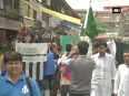 Mirwaiz umar farooqs supporters wave pak and let flags in srinagar