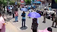 Carry umbrella, wear mask to buy liquor in Visakhapatnam