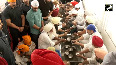 Rahul cleans utensils as part of 'Sewa' at Golden Temple