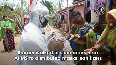 COVID-19 Odisha man dressed as Mahatma Gandhi distributes masks, sanitizers among people