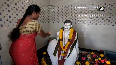 Andhra woman builds temple for dead husband, worships his statue