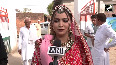 Bride arrives at polling station in Muzaffarnagar to cast vote