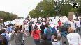 F##k Trump Hundreds hit streets against Trump s policies in Washington, demand his resignation