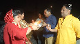 Women celebrate Karwa Chauth with their husbands