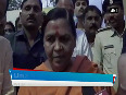 Watch Uma Bharti offers water to railway passengers