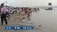 Devotees take holy dip in Ganga on Jyeshth Purnima