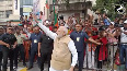 PM Modi stops car, greets enthusiastic supporters in B'luru