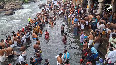 Devotees take holy dip in the river located in Tirunelveli on Mauni Amavasya 