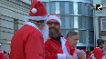 Hundreds of cyclists dressed as Santa rode through London to mark the 11th year of the Santa Cruise