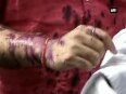 Watch Delhi resident hurls ink at Manish Sisodia