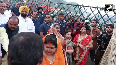 Delhi CM Rekha Gupta performs Chhath Puja rituals at Hathi ghat near ITO