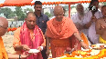 CM Yogi pours cement on stone during Poojan of Garbhagriha at Ayodhya s Ram Mandir