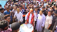 Defence Minister Rajnath Singh tries hands on drum at Holi celebration at his residence in Delhi