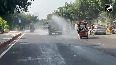 Noida Authority conducts water sprinkling on roads to mitigate effects of air pollution