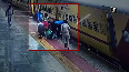 Alert passengers save woman from falling under moving train