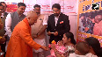 Yogi plays with kid, feeds kheer