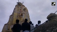Devotees Climb Submerged Temple for Aarti in Banswara