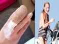 Lindsay cuts her finger in freak boating accident!