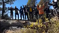 Arnold Dix celebrates with Uttrakhands SDRF Police Rescue unit