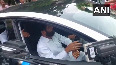 Watch: Eknath Shinde drives Tesla outside Vidhan Bhavan in Mumbai