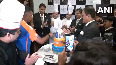 Rohit, Rahul Dravid cut the cake at the hotel