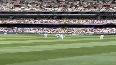 Pitch invader hugs Kohli