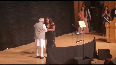 US singer touches Modi's feet after singing 'Jana Gana Mana'
