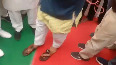 Scindia helps MP minister wear 'chappal' he had abandoned as vow