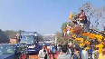 Bulldozers used to shower petals on UP legislators visiting Ayodhya