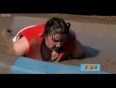 Fat woman total wipeout bounces off red balls
