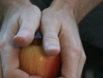 Super-human strength - halve an apple with your bare hands