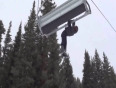 Boy hangs on ski lift video