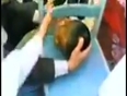 Boy head traps in school chair video