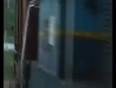 Girl survives train hit video
