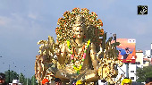 Kanwar Yatris from Gurugram carry 800-1,000 kg Golden Shiva Kanwad on wheels in Haridwar