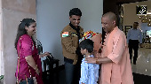 Yogi meets astronaut Shubhanshu Shukla on arrival in Lucknow
