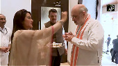 Amit Shah Visits Devendra Fadnavis' Residence for Ganesh Chaturthi Festivities