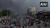 Nepal's parliament set on fire after PM resigns over anti-corruption protests