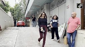 Saiee Manjrekar stuns in wine pants and sleek street style