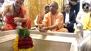 Yogi offers prayers at Kashi Vishwanath Temple in Varanasi